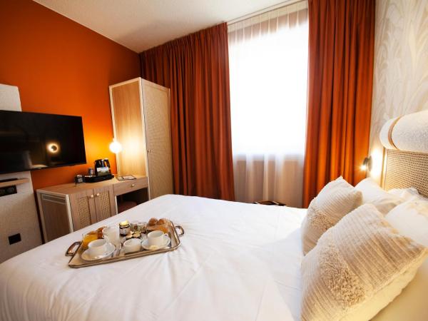 Kyriad Prestige Hotel Clermont-Ferrand : photo 1 de la chambre chambre double