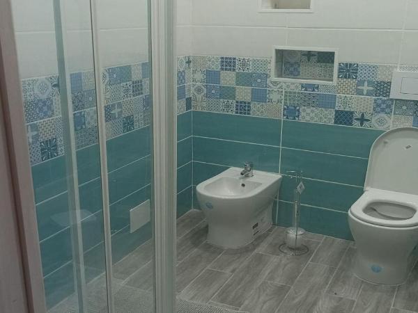 Il giardino nascosto : photo 9 de la chambre chambre quadruple avec salle de bains