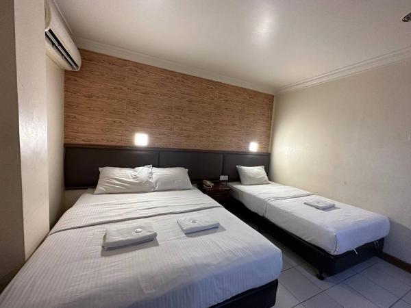 Lady Anne Hotel Sandkan : photo 2 de la chambre suite familiale deluxe