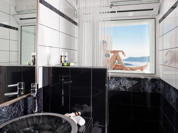 Asteras Villas : photo 7 de la chambre suite la luna avec jacuzzi - vue sur caldera