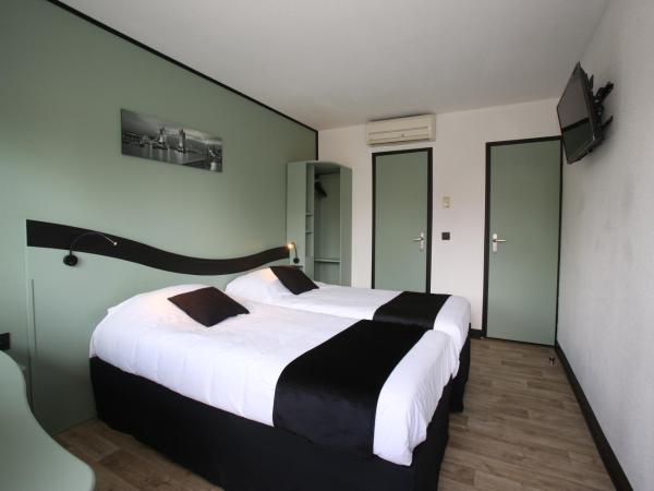 Enzo Hotels Chartres Mainvilliers by Kyriad Direct : photo 1 de la chambre hébergement standard - 2 lits simples