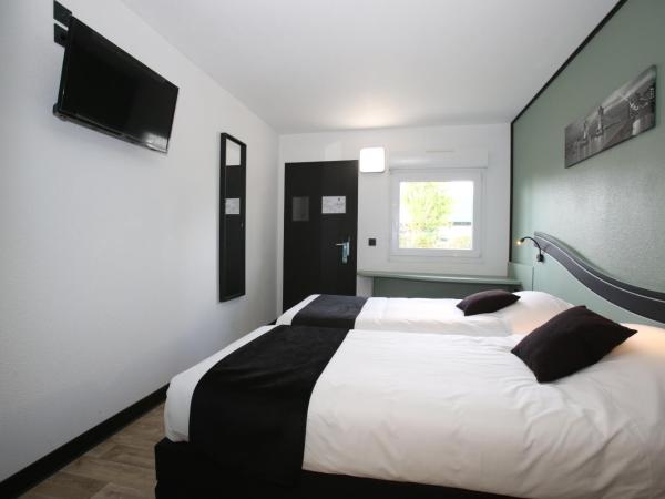 Enzo Hotels Chartres Mainvilliers by Kyriad Direct : photo 2 de la chambre hébergement standard - 2 lits simples