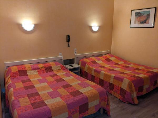 Hotel des Voyageurs : photo 1 de la chambre chambre quadruple