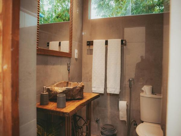 Eco Pousada Estrelas da Babilônia : photo 9 de la chambre suite junior avec salle de bains privative - vue sur jardin