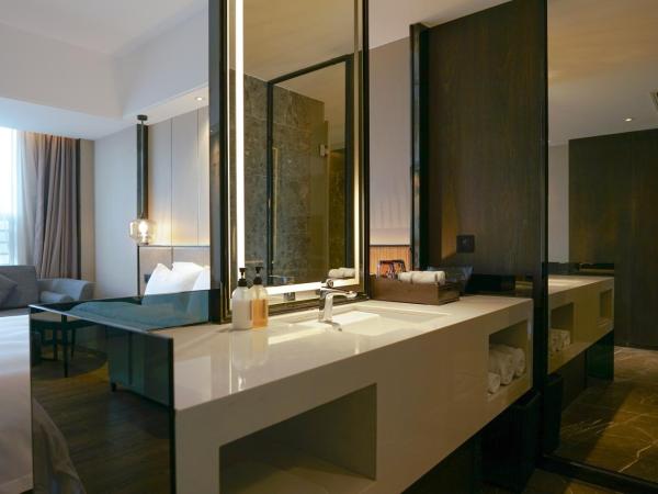 Paco Hotel Datang Metro Guangzhou-Free Shuttle Bus for Canton Fair : photo 4 de la chambre chambre lit king-size deluxe