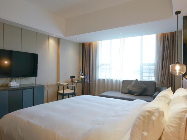 Paco Hotel Datang Metro Guangzhou-Free Shuttle Bus for Canton Fair : photo 2 de la chambre chambre lit king-size deluxe