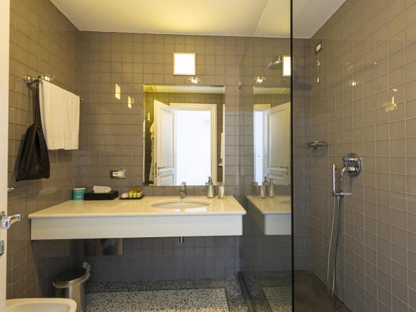 Roccobarocco Boutique Hotel : photo 6 de la chambre chambre lit king-size - vue sur mer