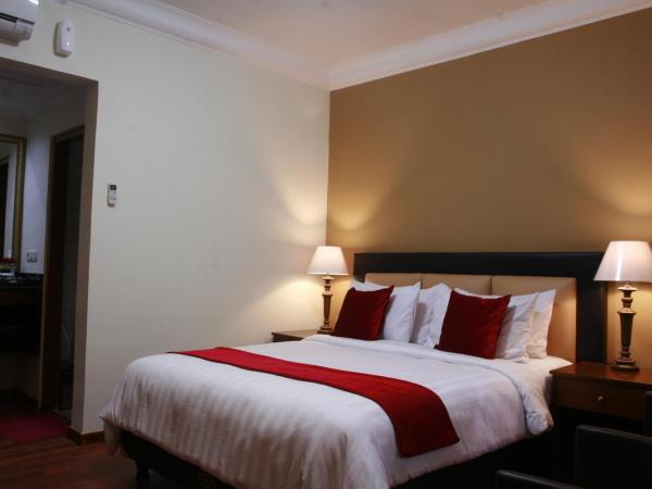 Griya Wijilan Syariah : photo 1 de la chambre chambre deluxe