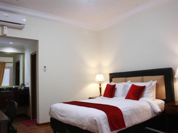 Griya Wijilan Syariah : photo 1 de la chambre chambre double supérieure