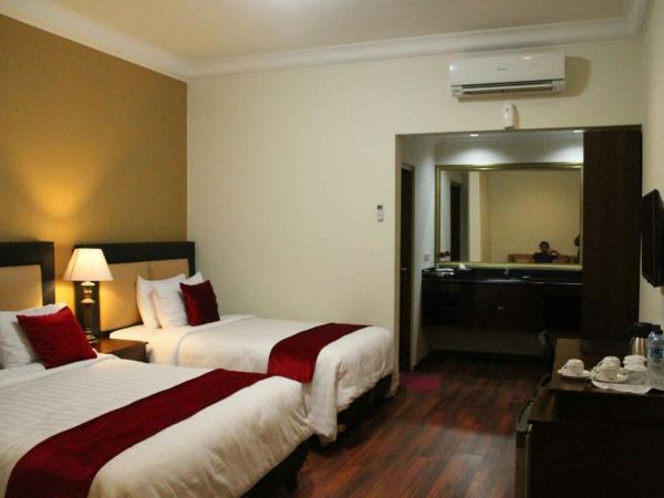 Griya Wijilan Syariah : photo 1 de la chambre chambre familiale