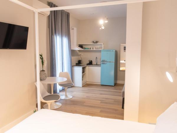 MeYia studios : photo 3 de la chambre studio lit king-size avec canapé-lit