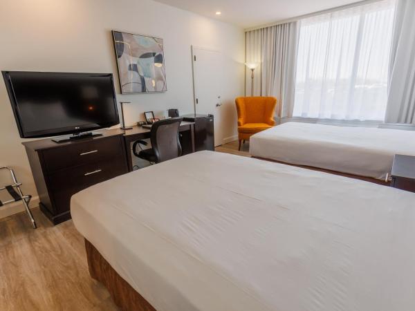Travelodge by Wyndham Quebec City Hotel & Convention Centre : photo 1 de la chambre chambre double deluxe avec 2 lits doubles - non-fumeurs