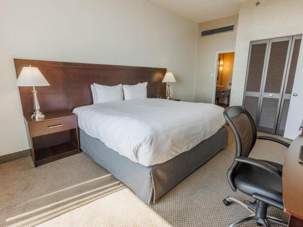 Travelodge by Wyndham Quebec City Hotel & Convention Centre : photo 1 de la chambre suite lit king-size exécutive - non-fumeurs