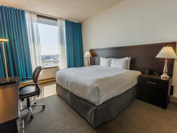 Travelodge by Wyndham Quebec City Hotel & Convention Centre : photo 3 de la chambre suite lit king-size exécutive - non-fumeurs