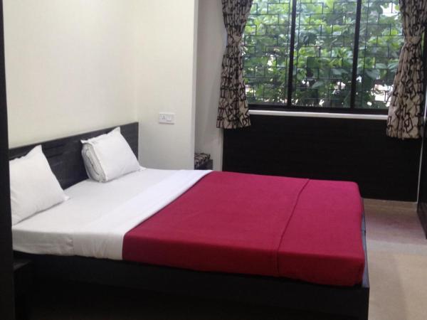 Hotel Nest International : photo 6 de la chambre chambre triple exécutive