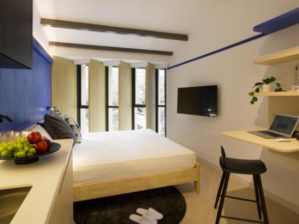 Coliwoo Keppel - CoLiving : photo 2 de la chambre garden view studio suite (k2)