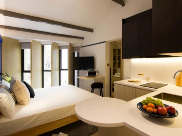 Coliwoo Keppel - CoLiving : photo 4 de la chambre garden view studio suite (k2)