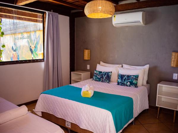 Bamboo Búzios Hostel : photo 2 de la chambre chambre triple standard - vue latérale sur mer