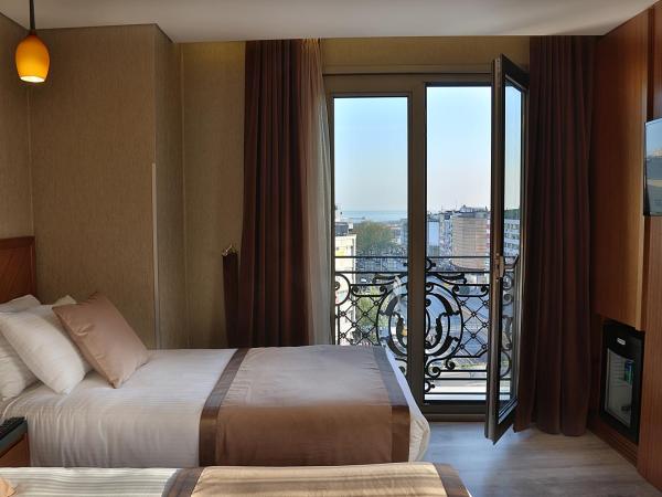 Corner Hotel Laleli : photo 1 de la chambre chambre familiale