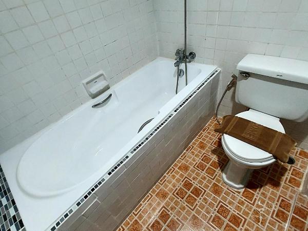 Traveller Inn Hotel : photo 4 de la chambre chambre lit queen-size deluxe