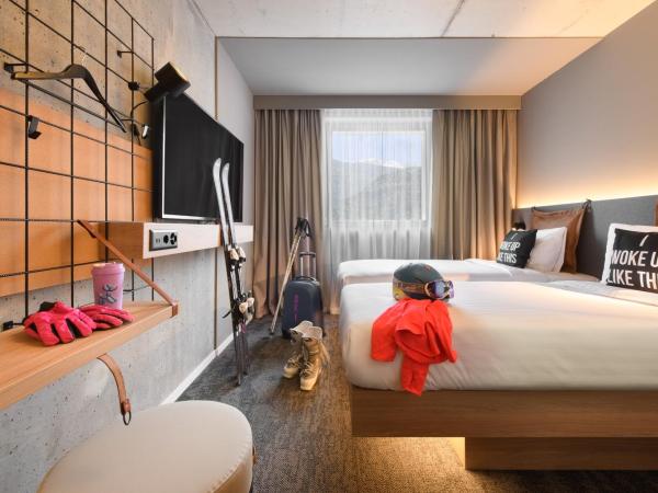 Moxy Sion : photo 1 de la chambre chambre lits jumeaux standard moxy