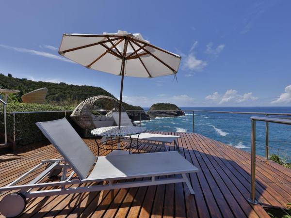 Cliffside Luxury Inn : photo 9 de la chambre bungalow deluxe - vue sur mer