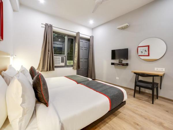 Townhouse Unitech Cyber Park Gurgaon Near Omaxe Celebration Mall : photo 7 de la chambre chambre triple classique