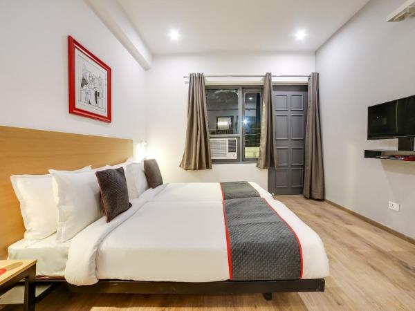 Townhouse Unitech Cyber Park Gurgaon Near Omaxe Celebration Mall : photo 9 de la chambre chambre triple classique