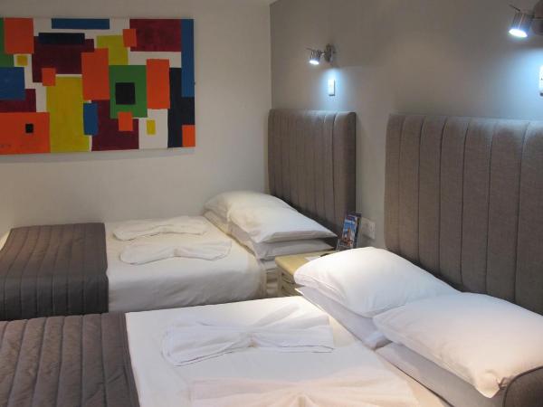 Alhambra Hotel : photo 4 de la chambre chambre quadruple