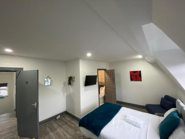 Nice Ensuite Rooms close to Anfield Stadium & city centre : photo 1 de la chambre chambre triple