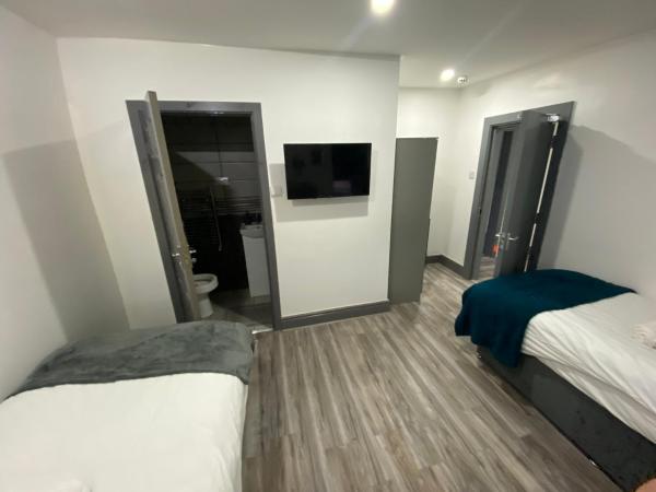 Nice Ensuite Rooms close to Anfield Stadium & city centre : photo 2 de la chambre chambre double ou lits jumeaux deluxe – vue sur jardin