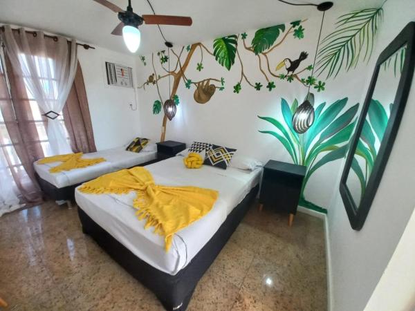 Pousada Costa Del Sol : photo 8 de la chambre chambre triple avec balcon