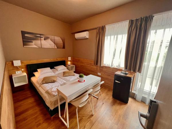 Boutique Hotel & Event Center : photo 10 de la chambre suite avec baignoire spa