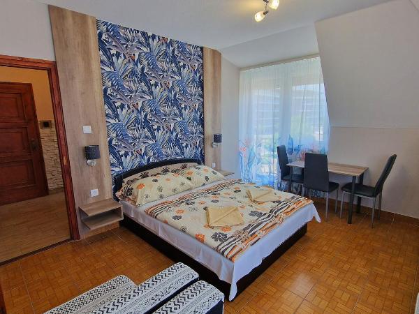 Napsugár Apartmanház : photo 2 de la chambre appartement 1 chambre