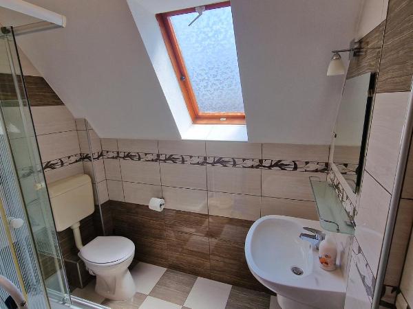 Napsugár Apartmanház : photo 4 de la chambre appartement 1 chambre