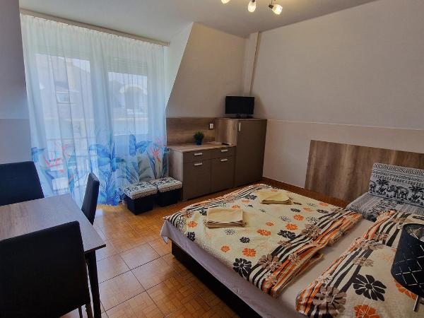 Napsugár Apartmanház : photo 1 de la chambre appartement 1 chambre