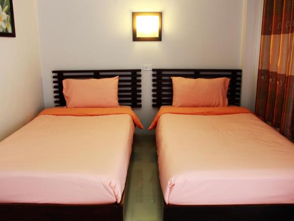 Pornkasem House : photo 1 de la chambre chambre lits jumeaux