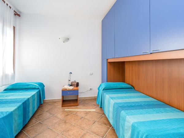 Le Dimore di Nettuno - Happy Rentals : photo 7 de la chambre appartement - vue sur piscine