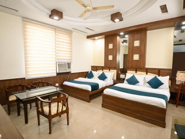 Hotel Baba Deluxe at New Delhi Railway Station -By RCG Hotels : photo 6 de la chambre suite familiale deluxe