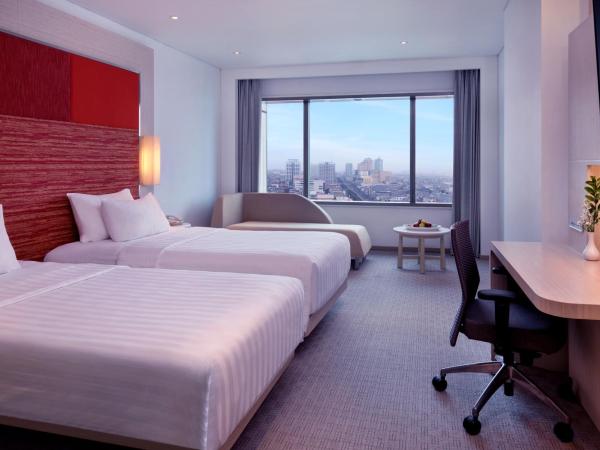 Grand Mercure Jakarta Harmoni : photo 5 de la chambre chambre lits jumeaux deluxe