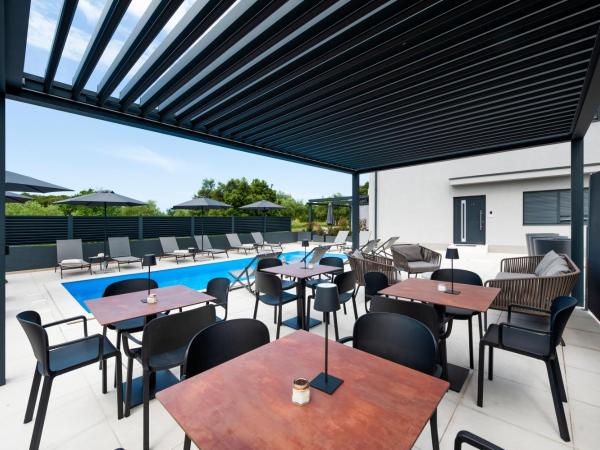 Luxury Residence Levante : photo 7 de la chambre chambre lit king-size deluxe