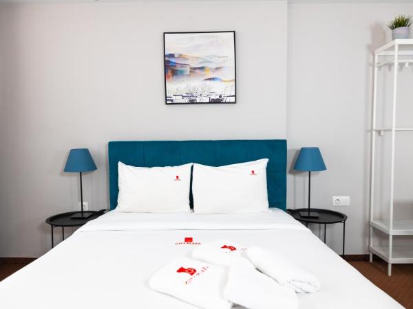 City Plaza Apartments & Rooms : photo 5 de la chambre chambre supérieure avec balcon