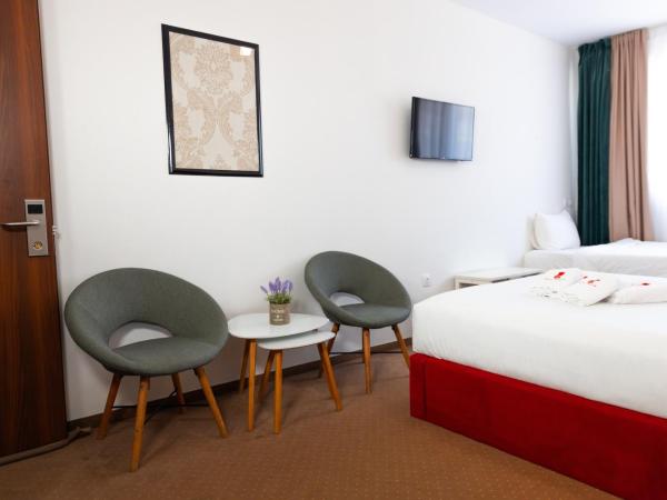 City Plaza Apartments & Rooms : photo 3 de la chambre chambre triple supérieure