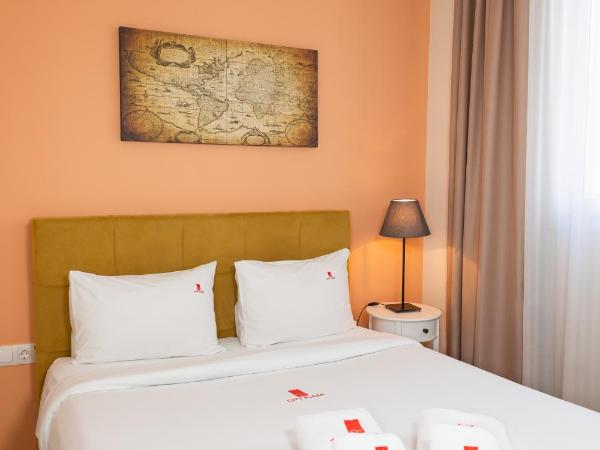 City Plaza Apartments & Rooms : photo 5 de la chambre chambre confortable
