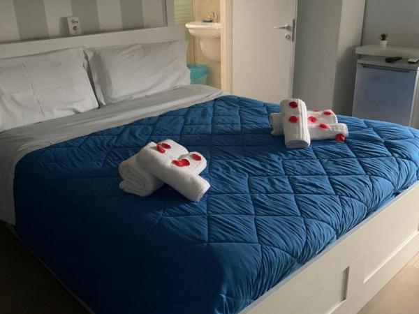 i girasoli srls : photo 3 de la chambre chambre familiale avec salle de bains privative