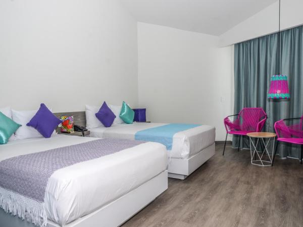 Fontan Ixtapa : photo 3 de la chambre chambre double deluxe - vue latérale sur mer