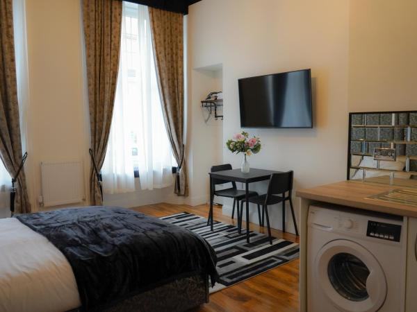 S.H Apartments : photo 1 de la chambre studio supérieur