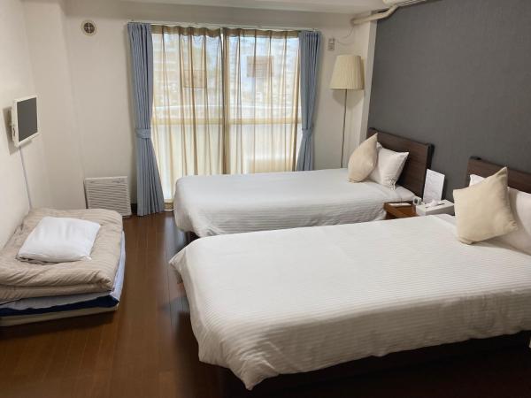 Stay Airport : photo 1 de la chambre chambre triple