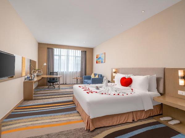 Guangzhou Baiyun Airport Rejoice by Argyle Hotel Rehe Metro Exit B --Free shuttle bus is provided during the 136th Canton Fair : photo 10 de la chambre chambre lit queen-size deluxe