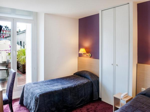 Hôtel Continental : photo 5 de la chambre chambre lits jumeaux